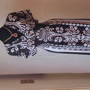 MILANO,medium size, maxi, black/white dress with open v-neck that gathers  waist